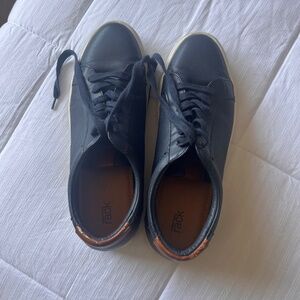 Blue leather sneakers with white soles size 9.5